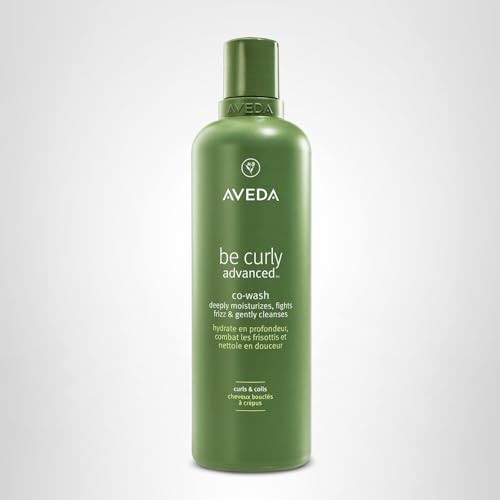 Aveda Be Curly Advanced Co-Wash for curly and coily hair, showing the product bottle and curly hair strands.