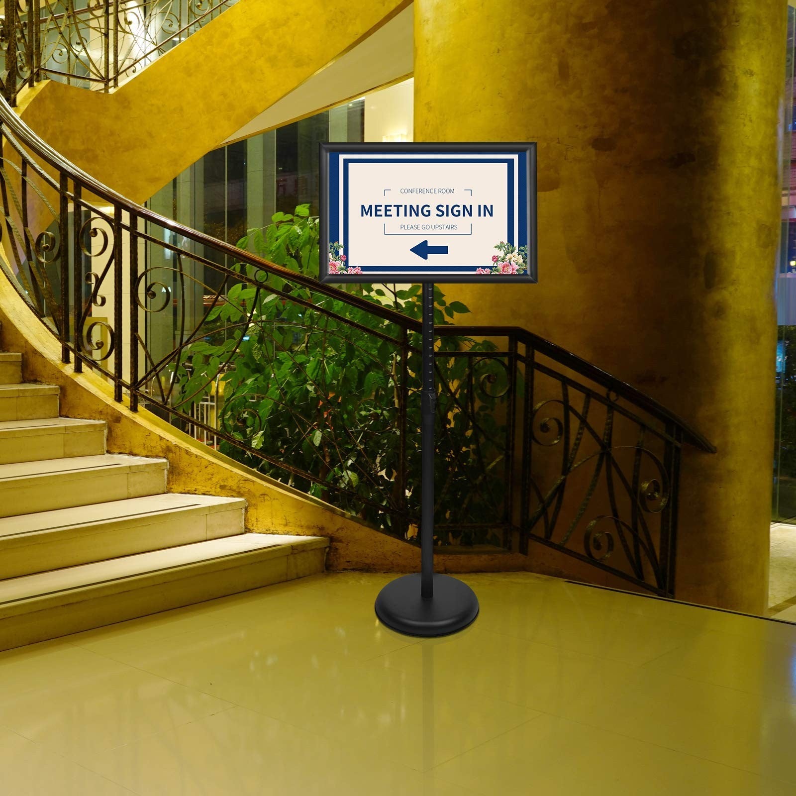 Yiyo adjustable pedestal poster sign stand displaying 8.5x11 business menu or advertising poster in a retail setting