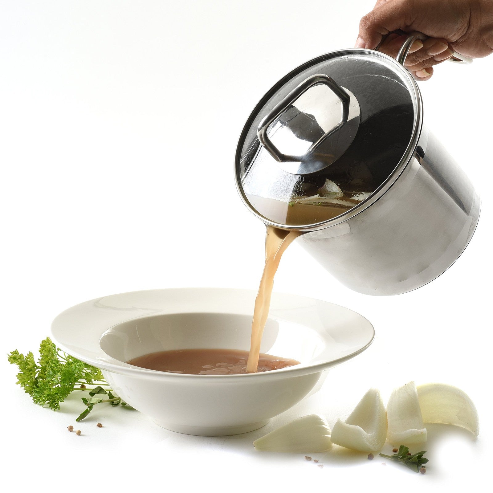 Norpro 8-cup stainless steel multi-pot with straining lid, showing the shiny pot with handle and lid on a kitchen countertop.
