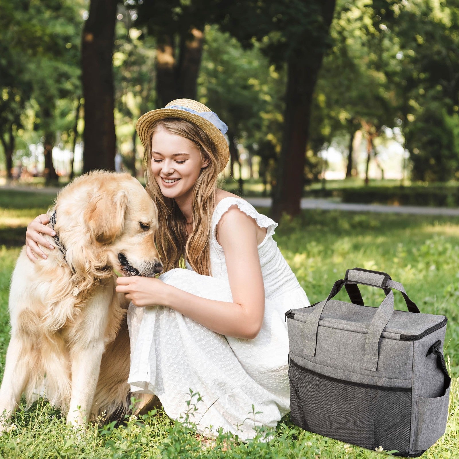 PETMAKER dog and cat travel bag with multiple pockets, including food containers and mat, for organized pet travel.