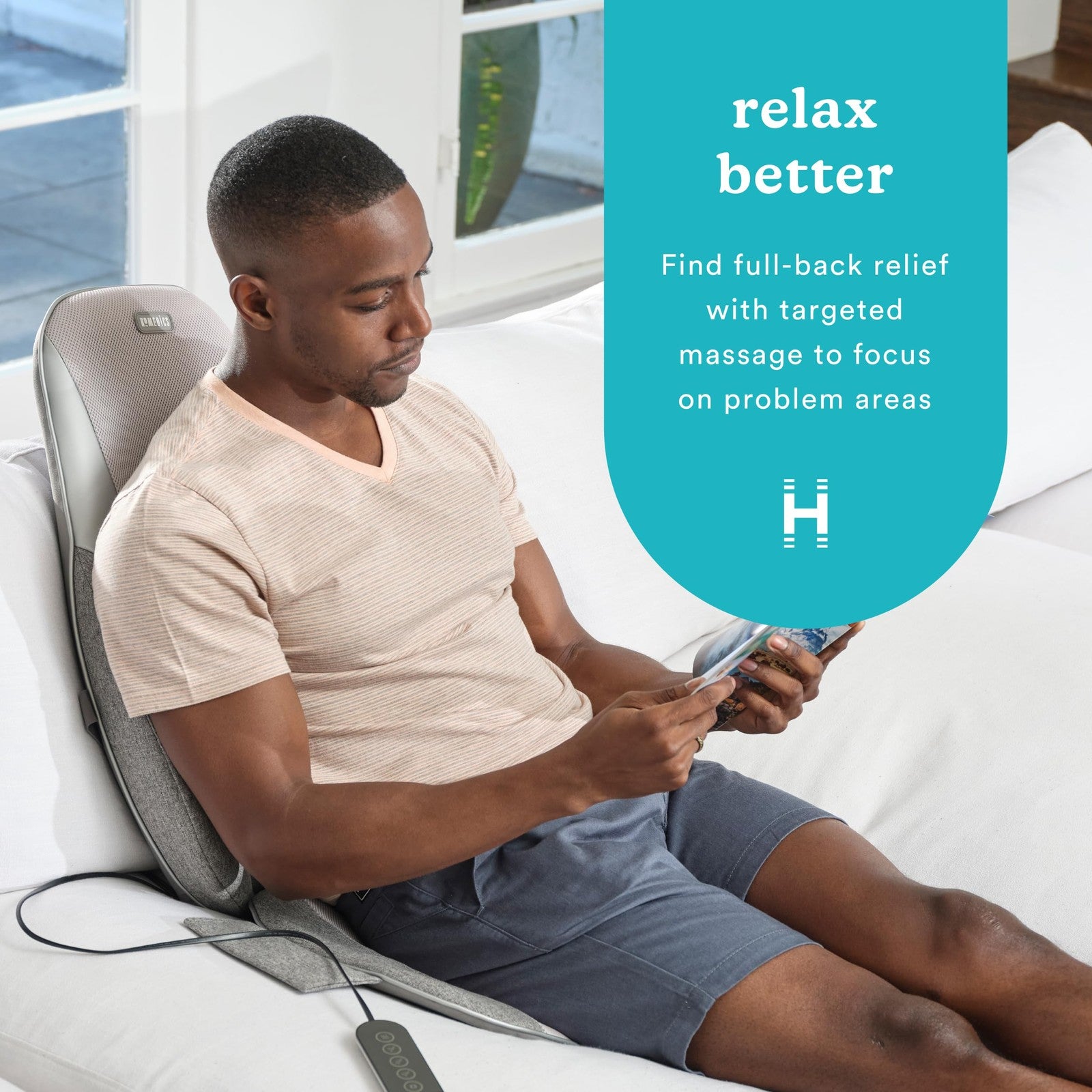 Homedics Shiatsu massage cushion with kneading and vibration for back relief, featuring heat function for comfort.