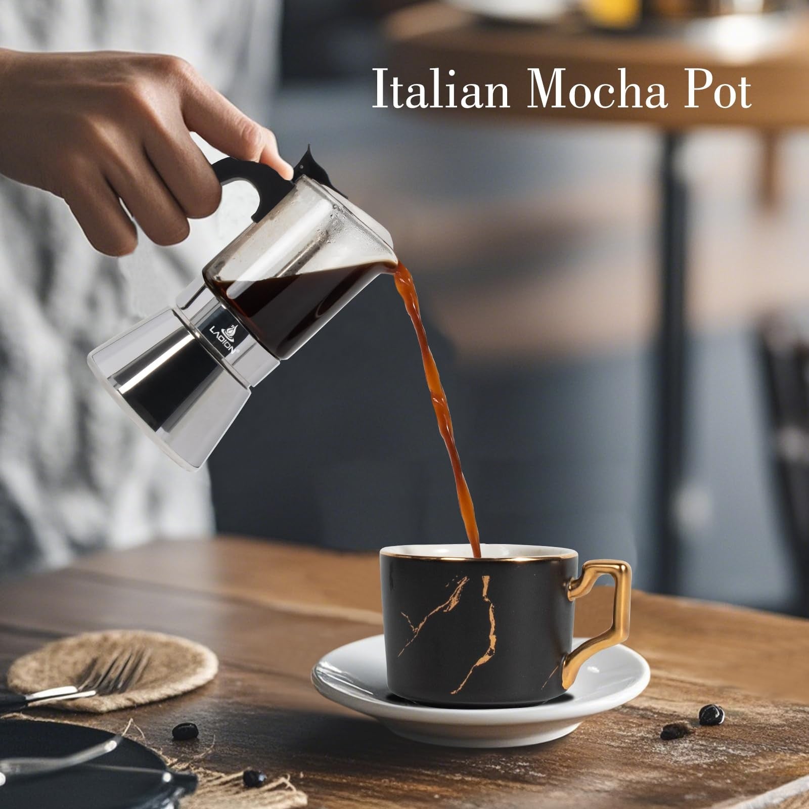 LAOION 3-cup stovetop espresso maker with crystal glass top and stainless steel body, compact moka pot for brewing coffee.