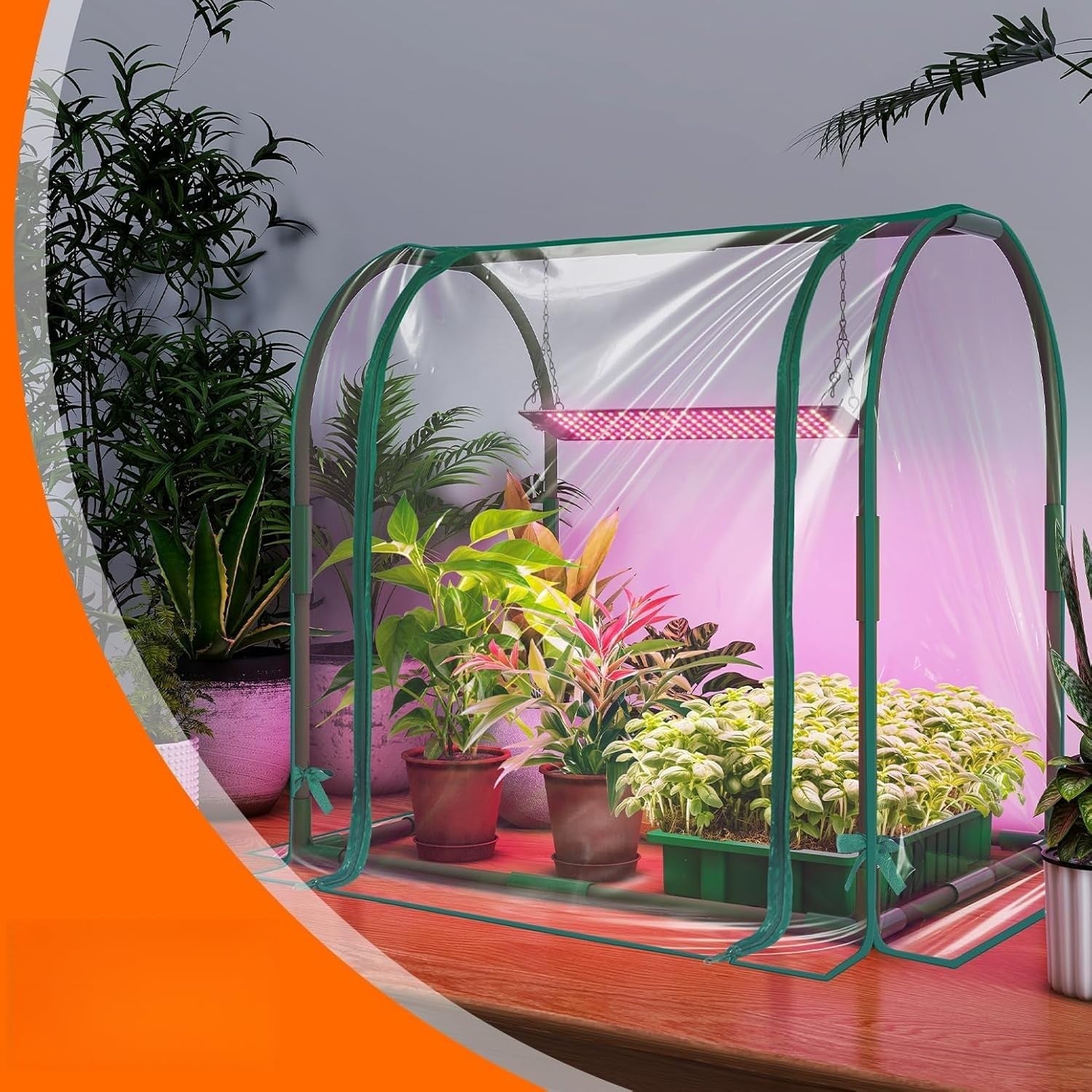 Bstrip Mini Indoor Greenhouse with LED grow lights on a desktop, featuring seed trays and a compact design for indoor gardening.