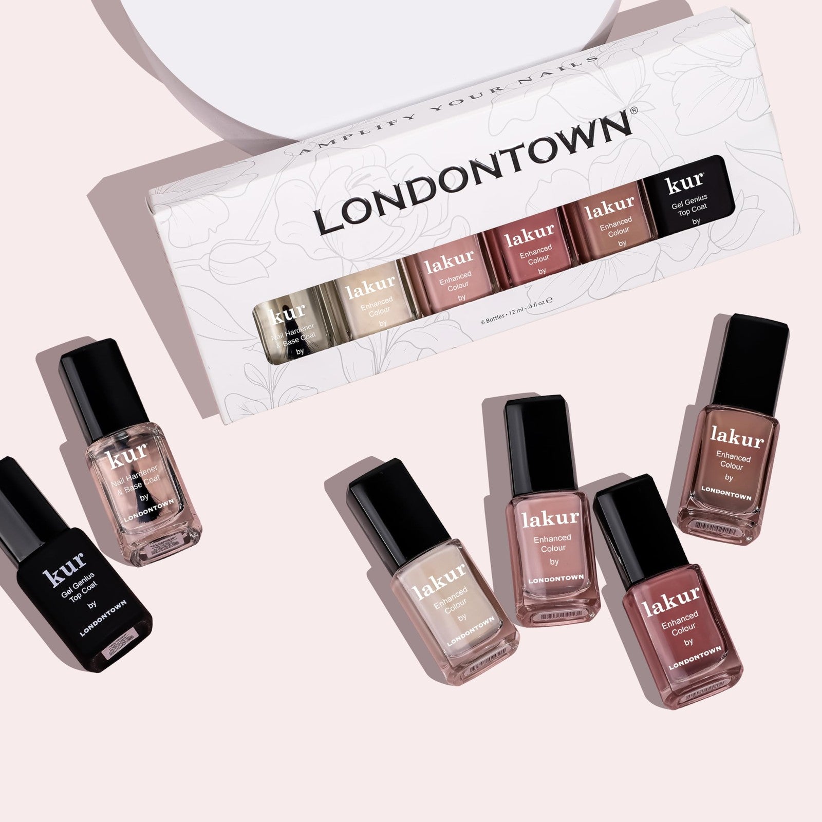 LONDONTOWN The Sophisticate Collection full manicure nail polish kit with various nail color bottles and tools.