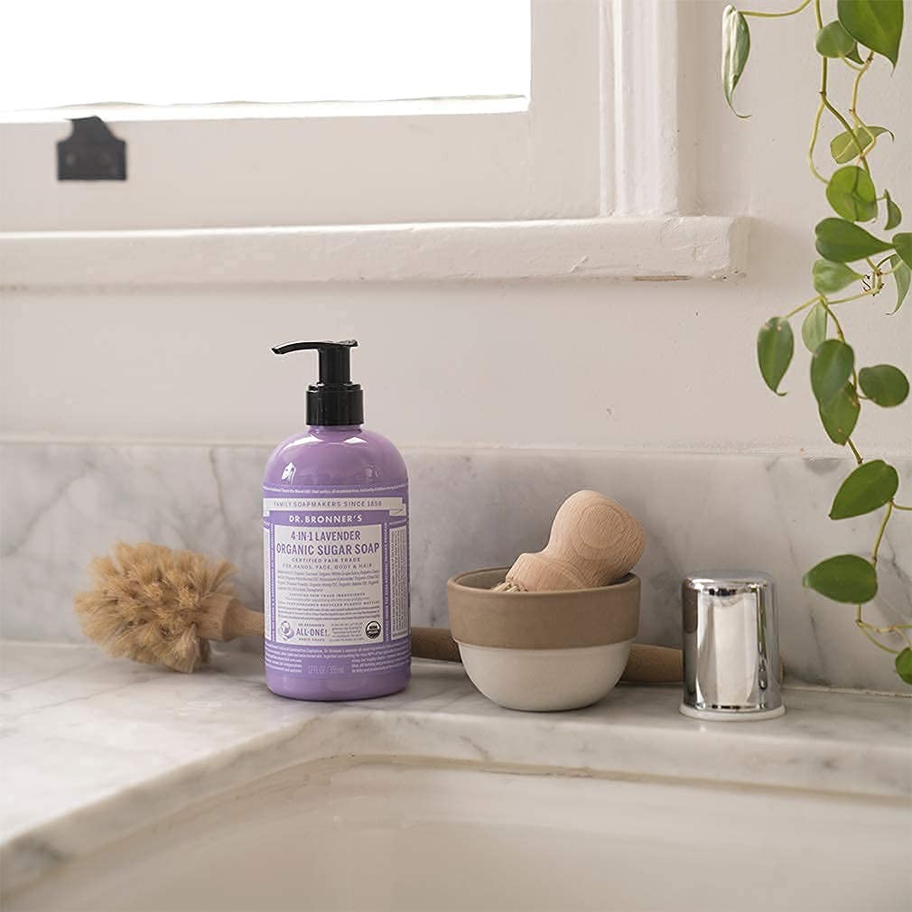 Dr. Bronner's Organic Sugar Soap variety pack with 12 oz bottles in lavender, peppermint, and tea tree scents, displayed with soap bottles.