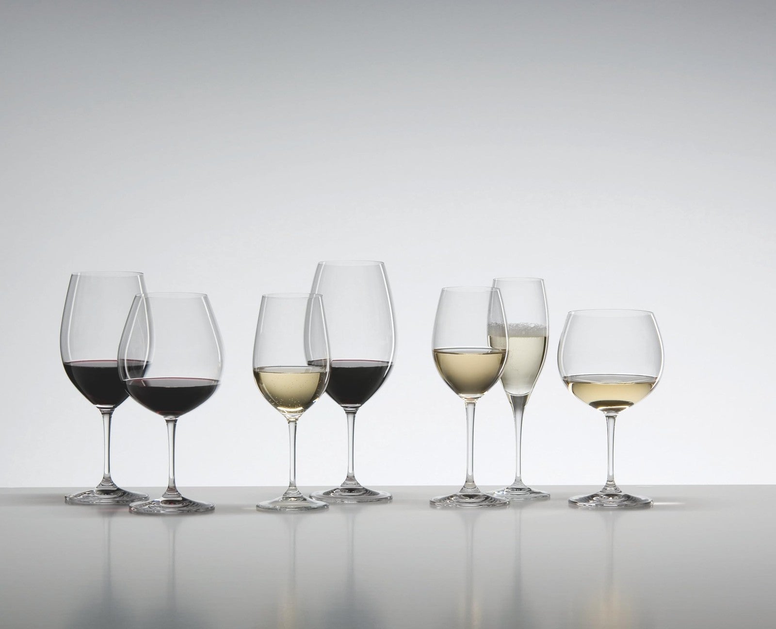 Pair of Riedel Vinum single malt whisky glasses with a clear design, shown in a dishwasher-safe set of two.