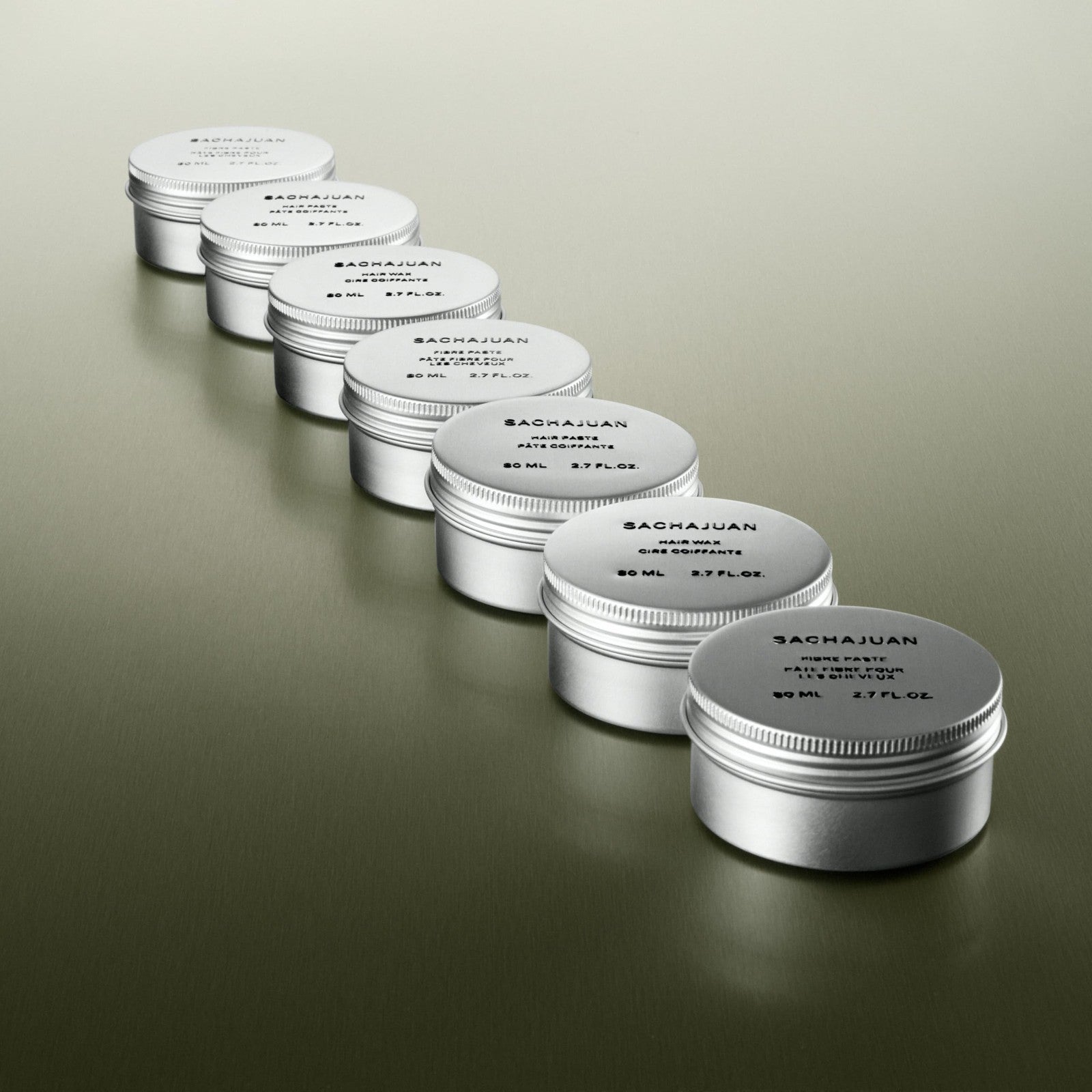 SACHAJUAN Hair Wax 80ml jar showing textured hair with shine, suitable for all hair types, creating a styled, glossy look.