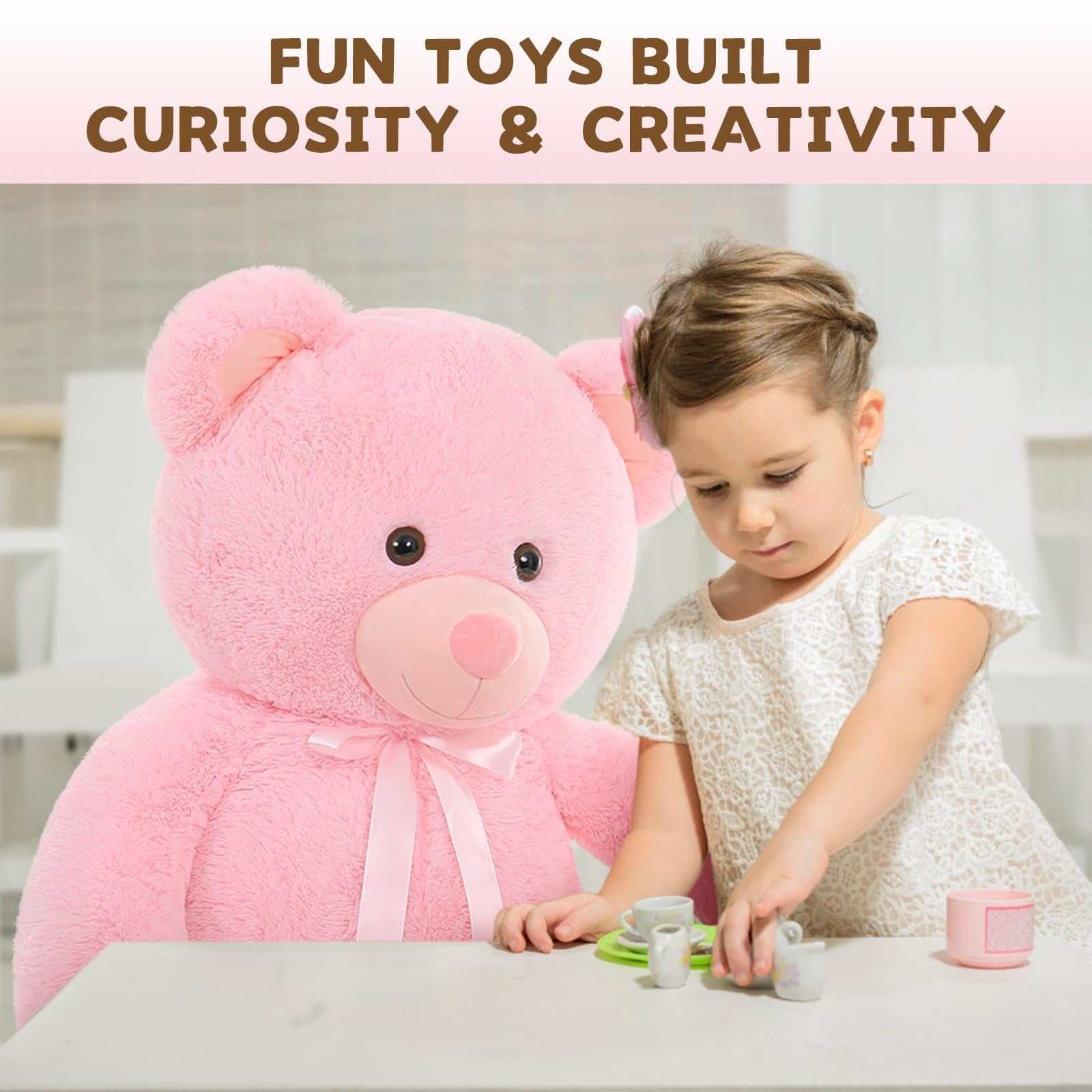 Pink 51-inch MorisMos giant teddy bear plush toy with silky ribbon bow and footprint design