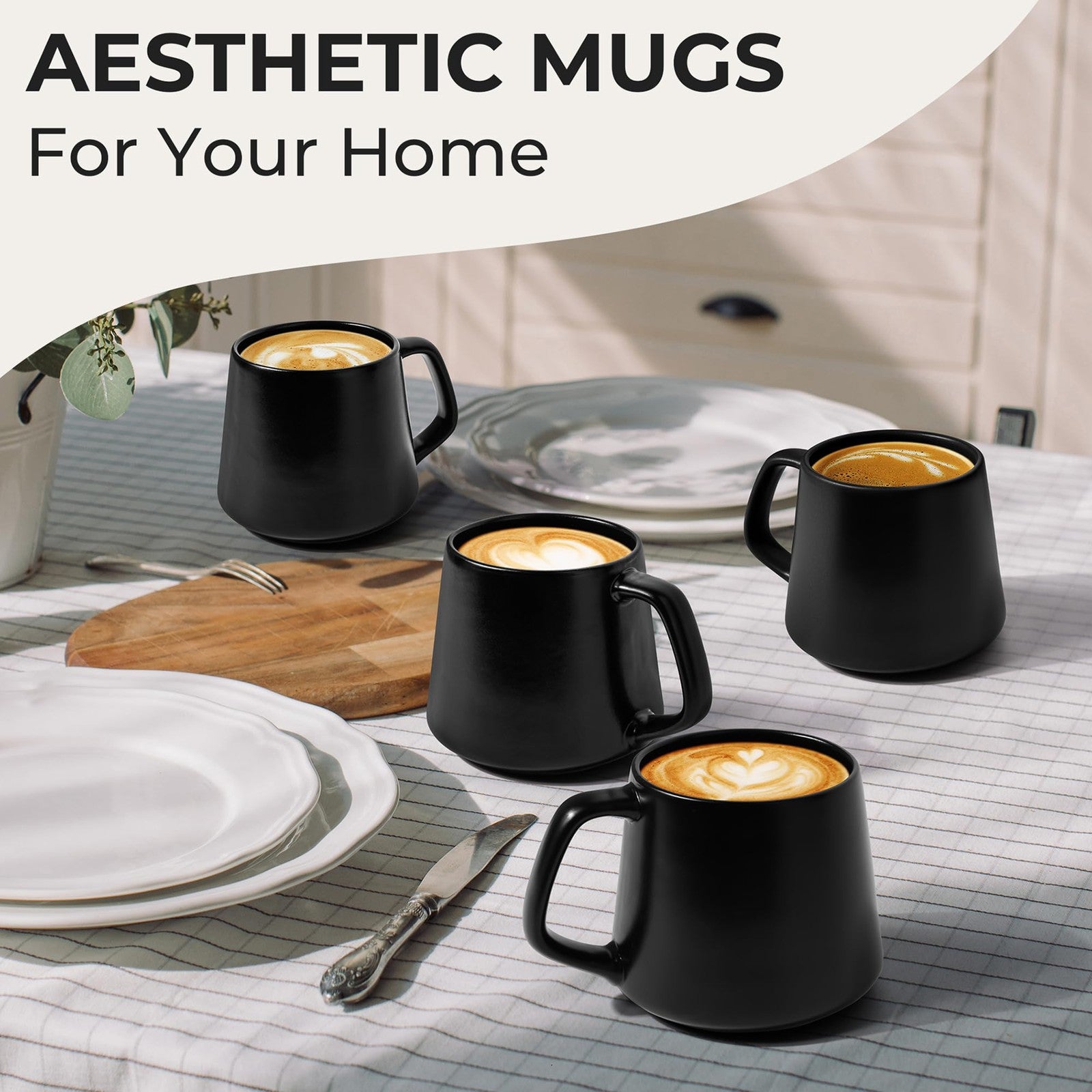 Set of four large black ceramic coffee mugs by MIAMIO, 14oz capacity, microwave and dishwasher safe, arranged on a wooden table.