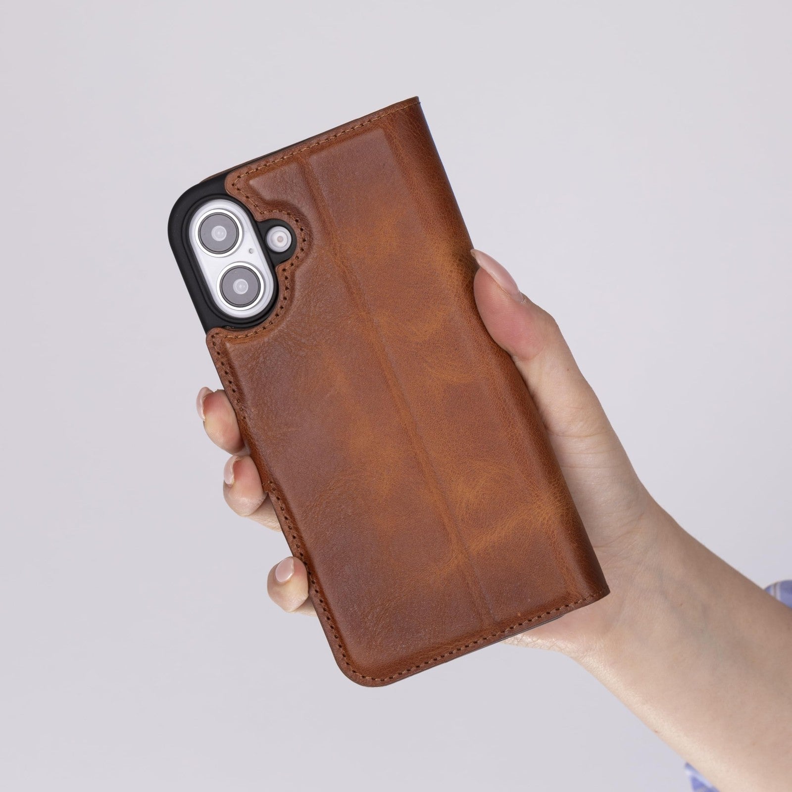 Venito iPhone 16 Plus wallet phone case with MagSafe compatibility, drop and impact protection, featuring a sleek design.