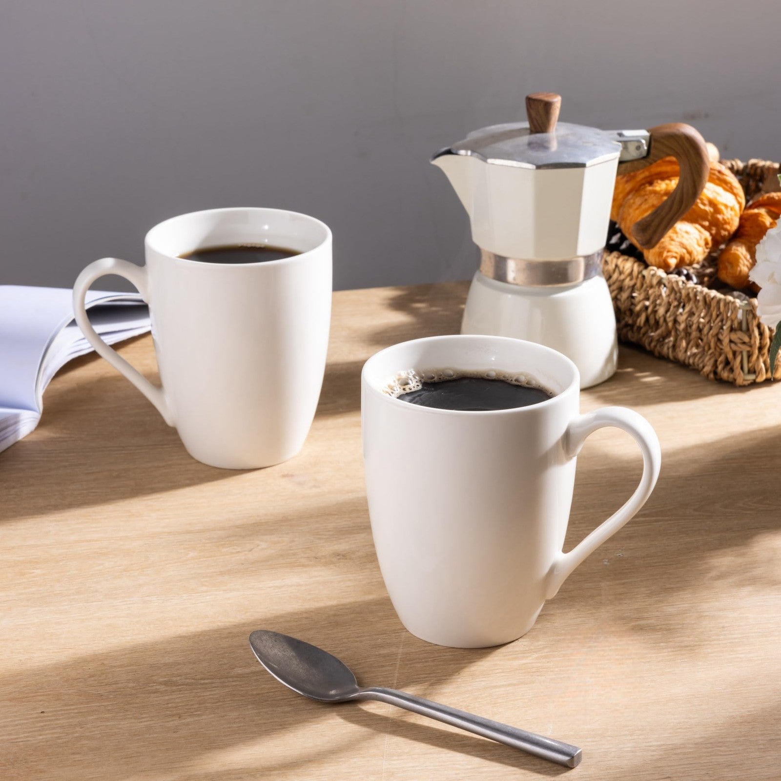 Set of six GBhome 16oz large ceramic coffee mugs with handles, suitable for men, women, and dads, displayed on a kitchen counter.