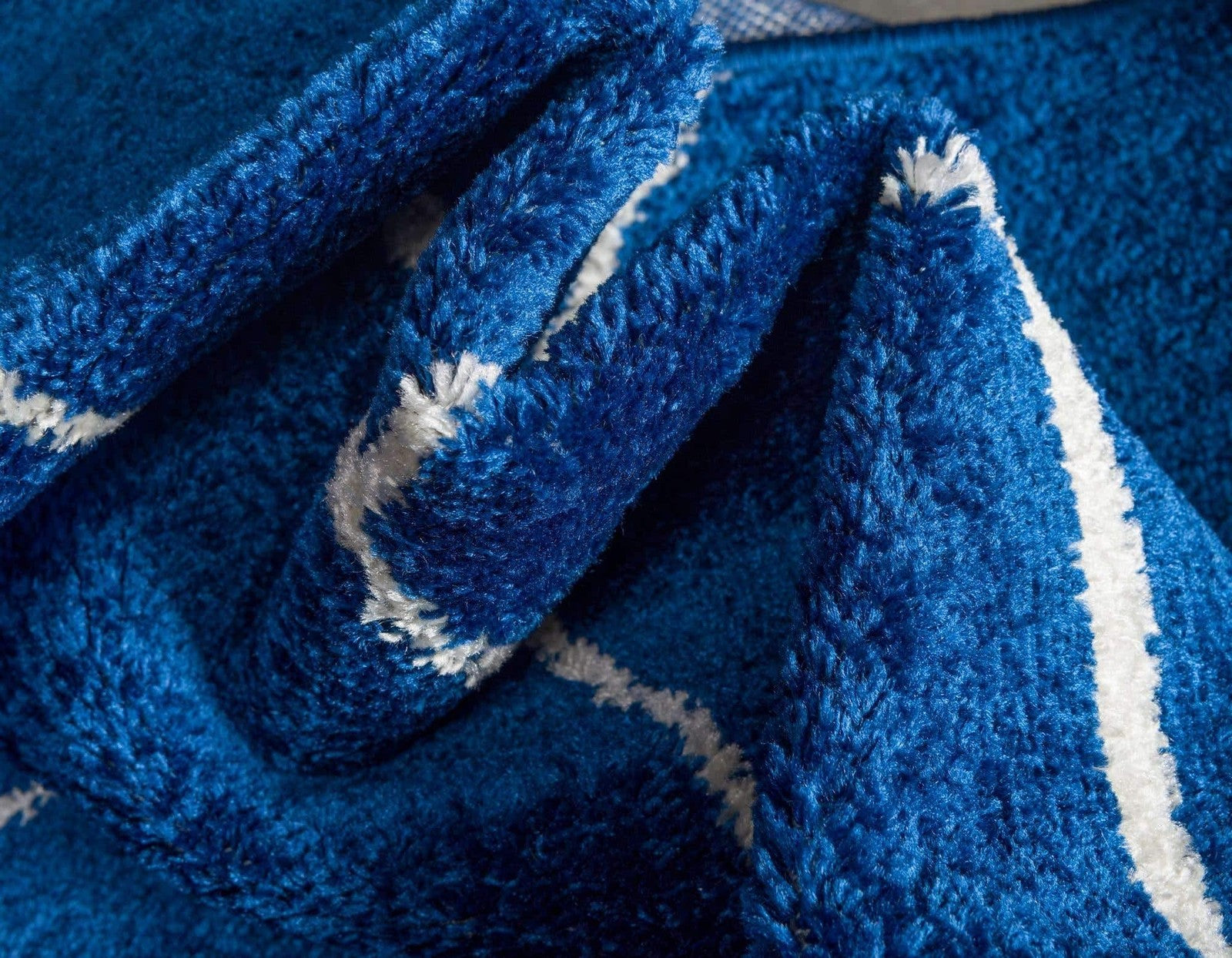 Navy blue geometric area rug from Unique Loom Trellis Frieze Collection with modern trellis pattern.