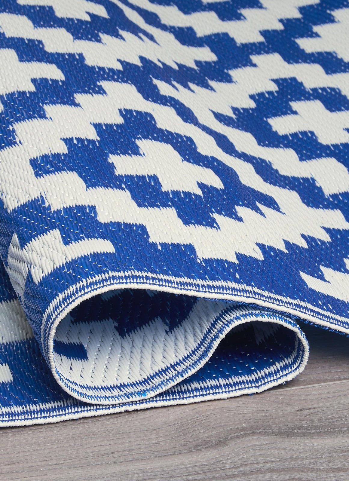 Outdoor camping rug by FH Home, waterproof and fade-resistant, reversible for versatile use in outdoor camping and picnics.