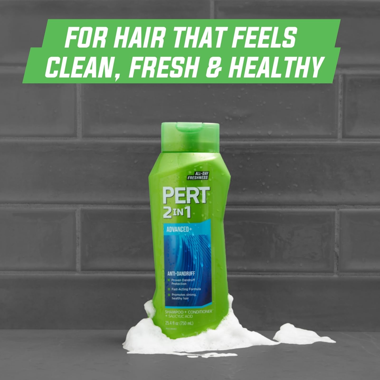 Pert Plus 2-in-1 shampoo and conditioner for dandruff control in a 25.4oz bottle, shown in a pack of four.