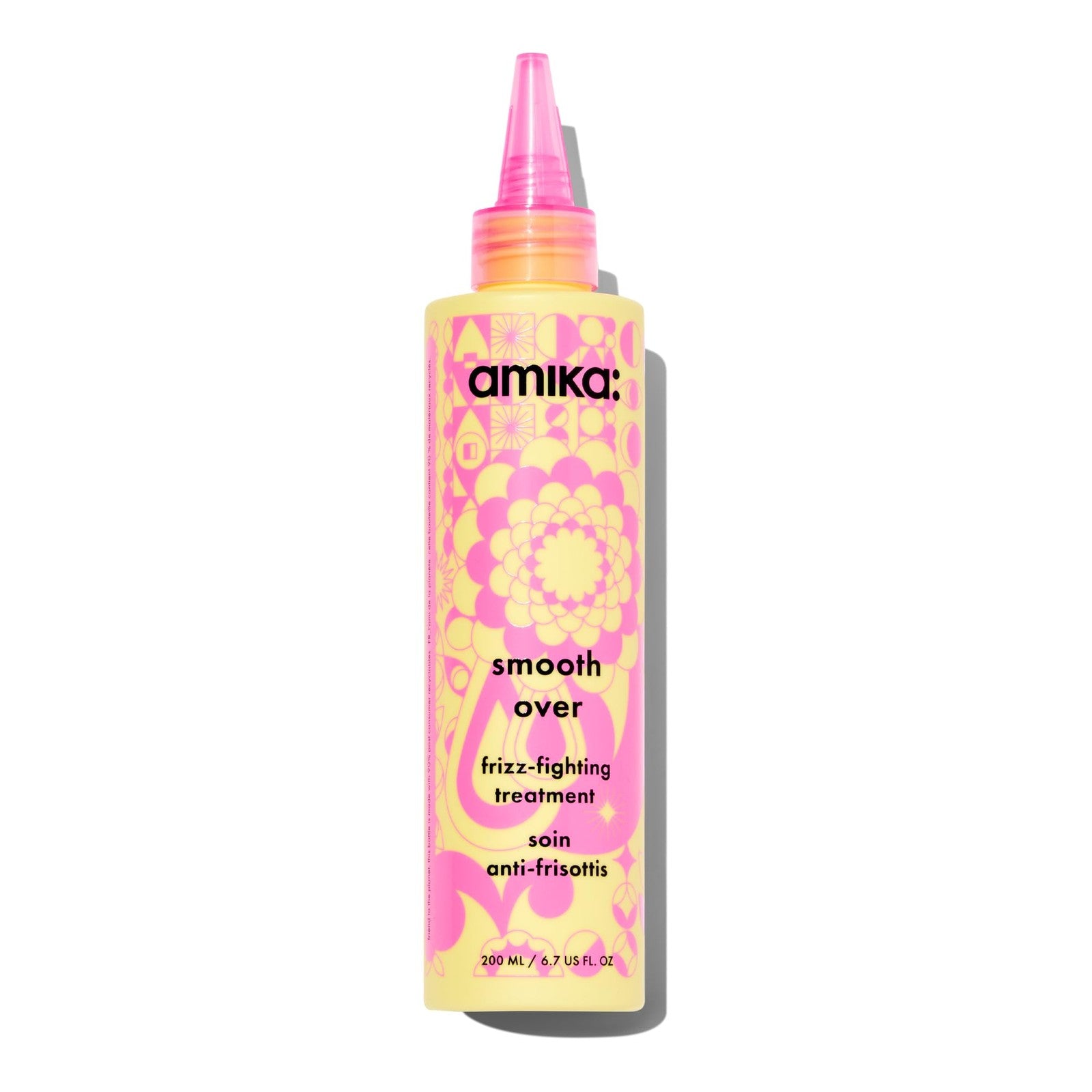 Amika Smooth Over Frizz-Fighting Treatment Mask in a jar, designed to reduce frizz and smooth hair.