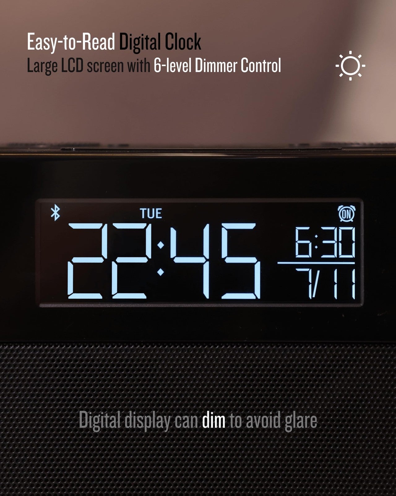 Soundfreaq Sound Rise II bedside alarm clock radio with Bluetooth speaker, digital display, and control buttons.