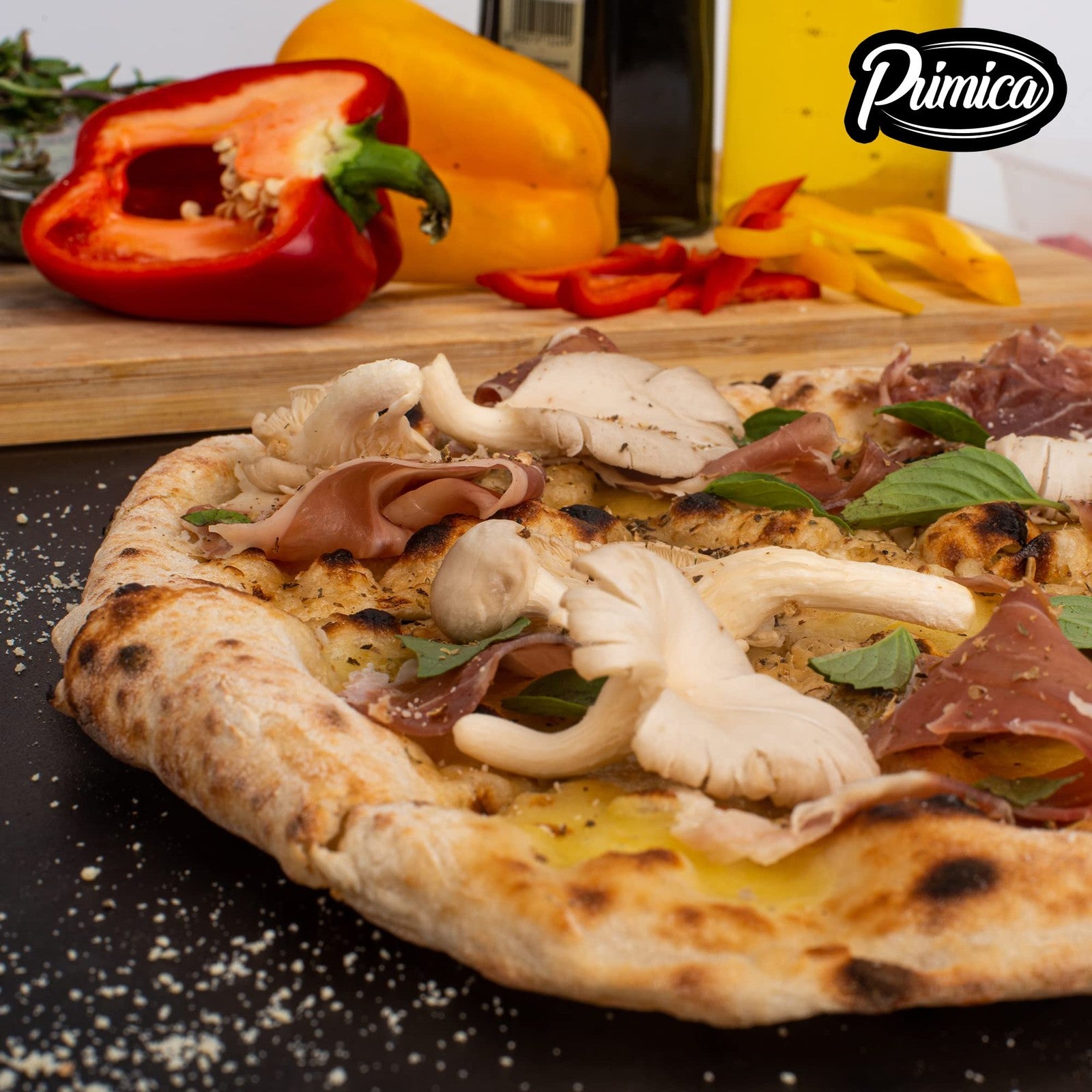 Primica pizza steel for oven grill, 13.6 x 13.6 inches, showing a crispy pizza crust on the steel surface.