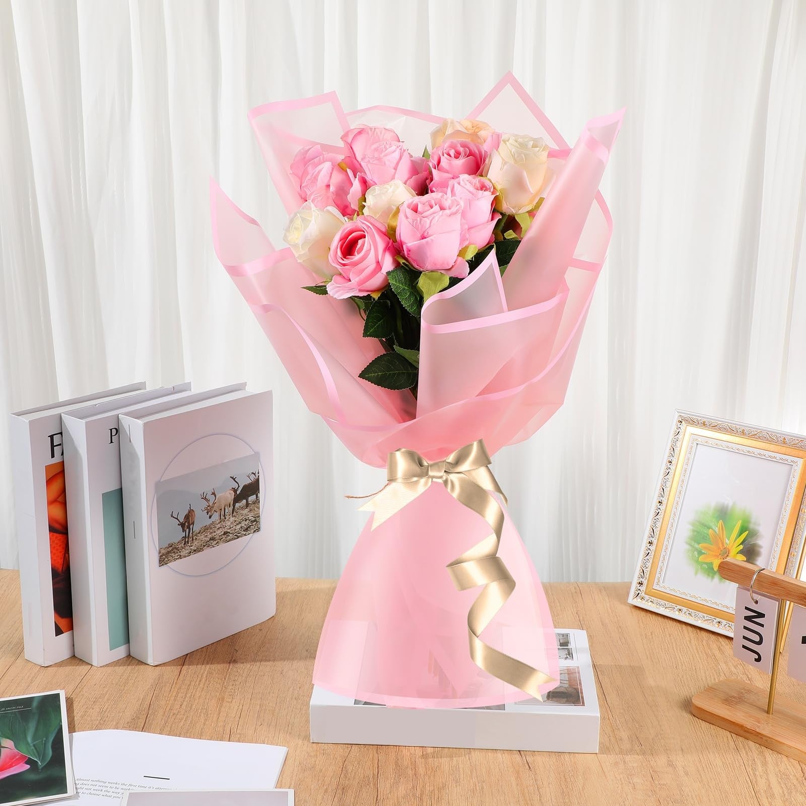 Ctosree 240 sheets flower wrapping paper, waterproof, measuring 22.8 x 22.8 inches, with colorful floral designs.