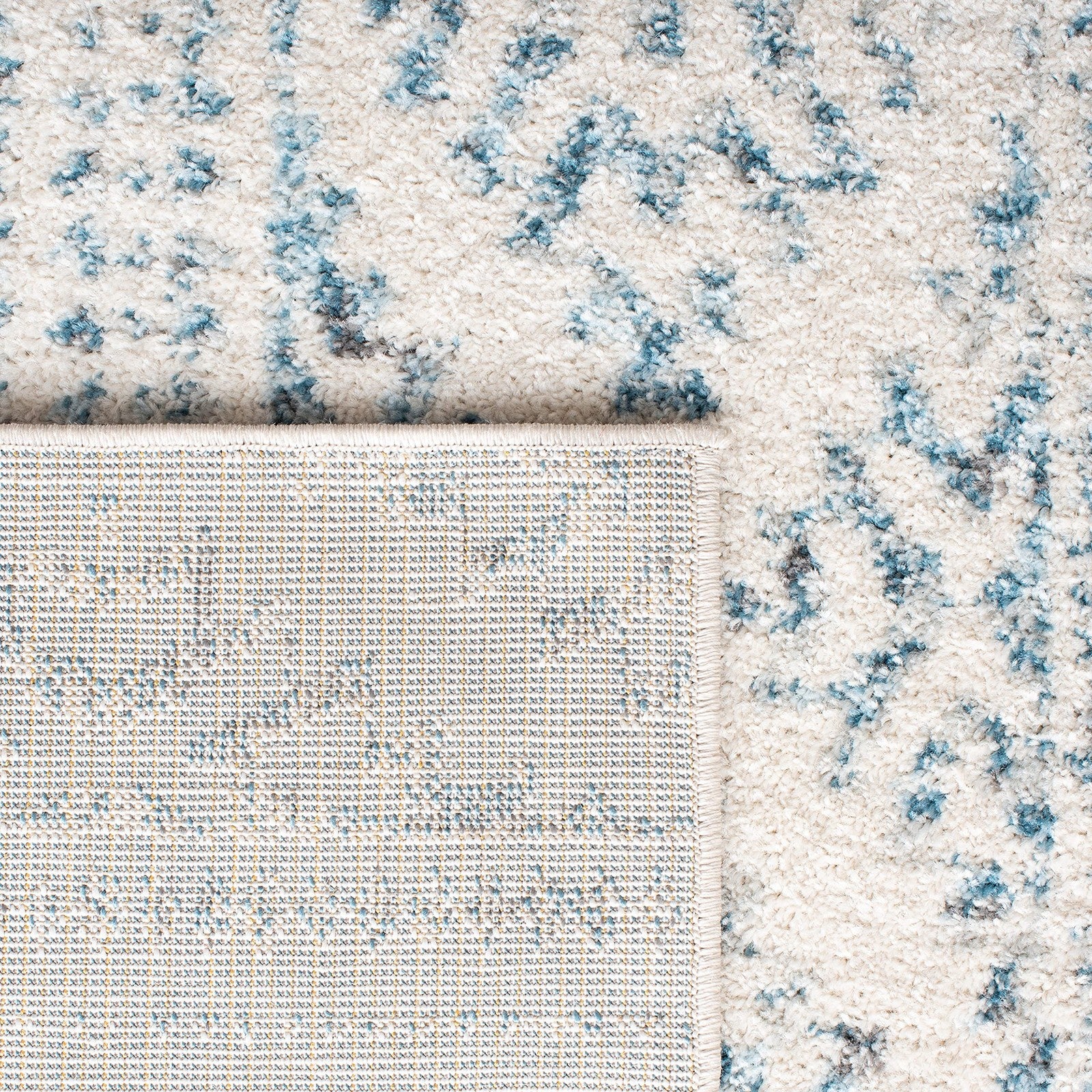 Safavieh Tulum Collection 6x9 ivory and turquoise Moroccan boho tribal area rug with tribal patterns and vibrant colors.