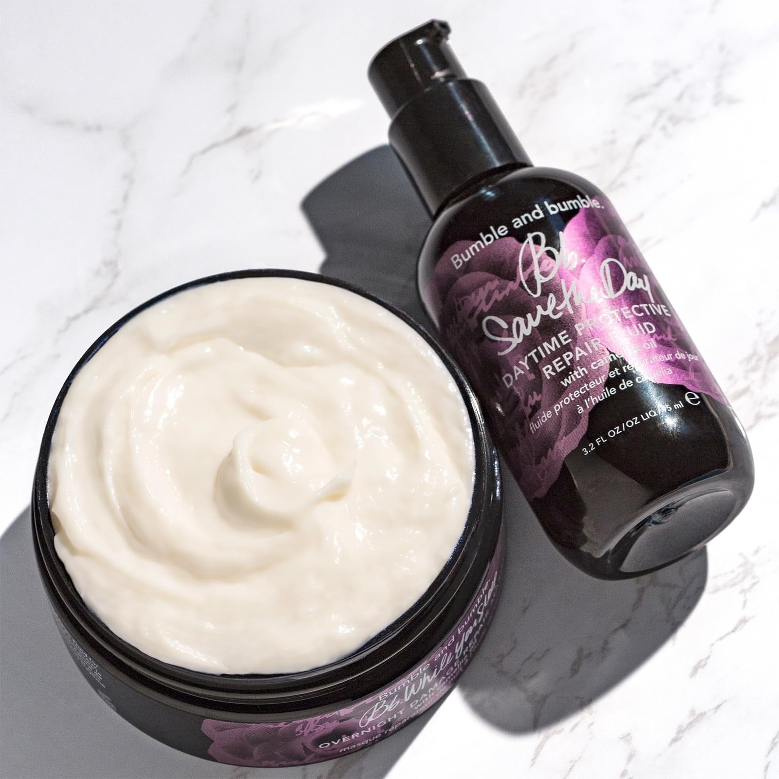 Bumble and bumble Save the Day Protective Hair Repair Fluid daily serum applied to smooth, shiny hair strands.
