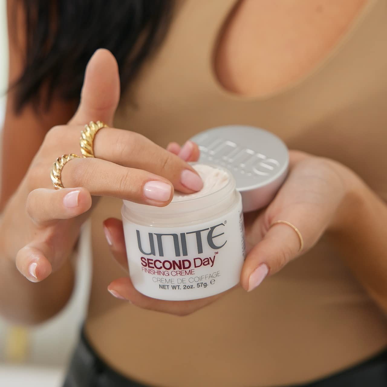 UNITE Hair Second Day Texturizing Finishing Cream tube with product label and simple design, ideal for effortless, lived-in hair texture.