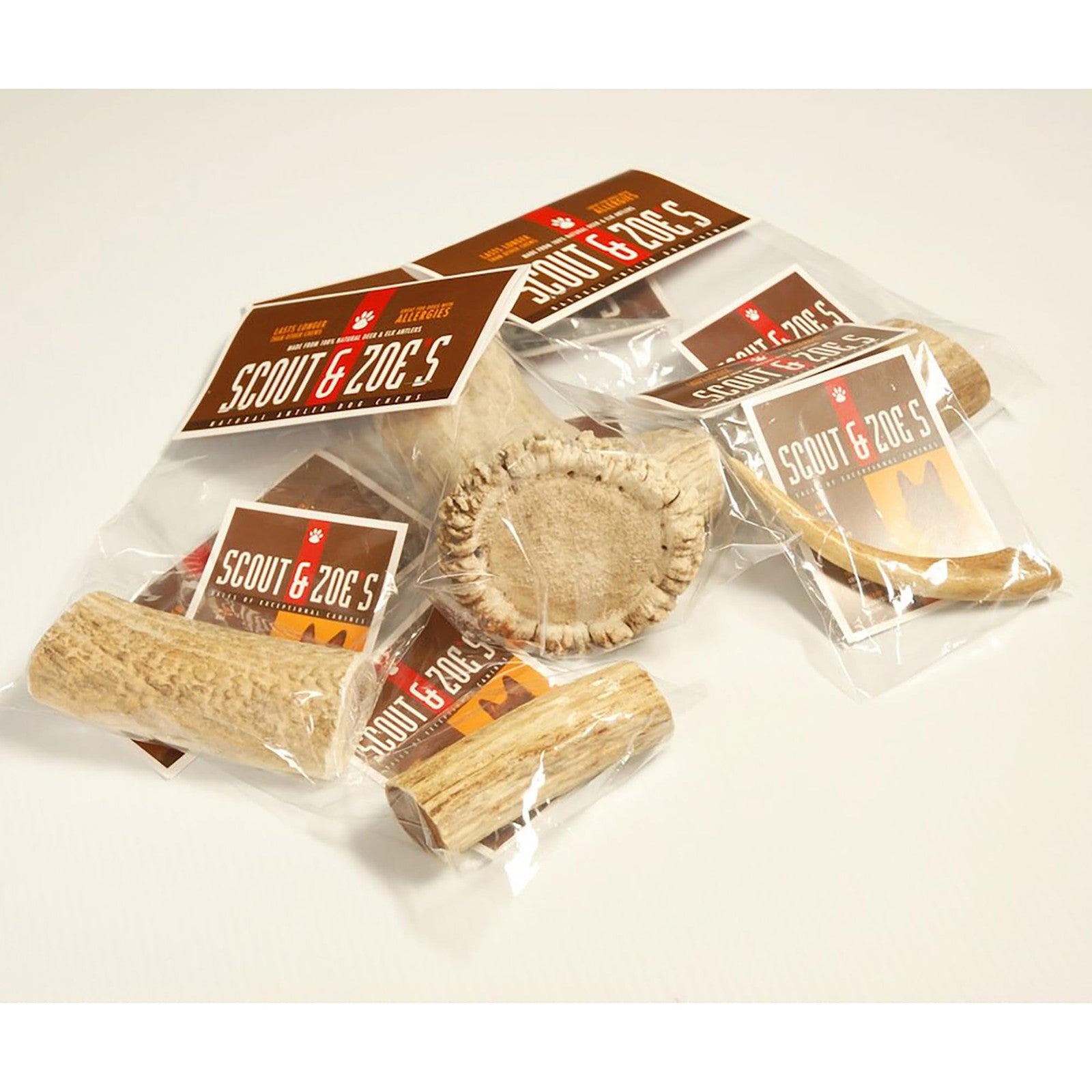 Scout & Zoe's Antler Splits for dogs, natural chew treats made from split antlers, shown in a close-up image.