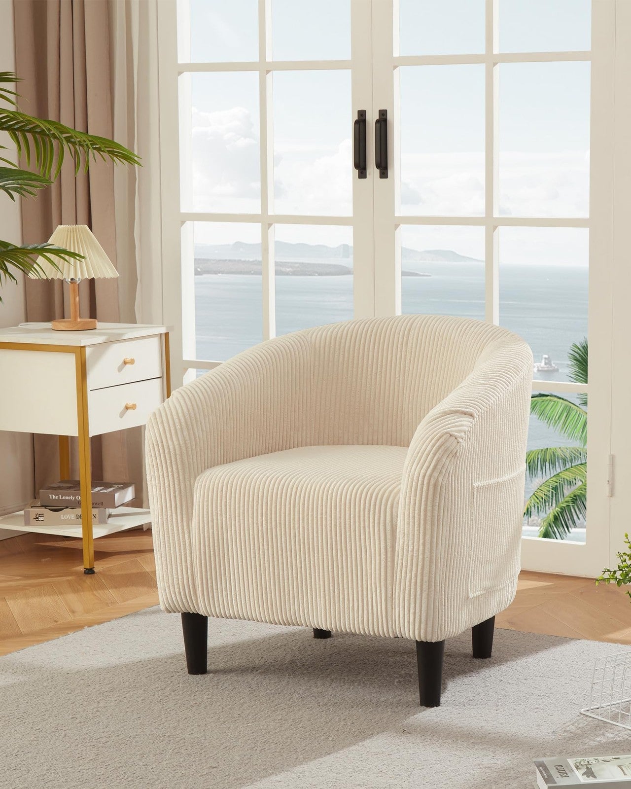 Corduroy barrel accent chair from Garveehome with plush upholstery and elegant arm design, ideal as a cozy club chair.