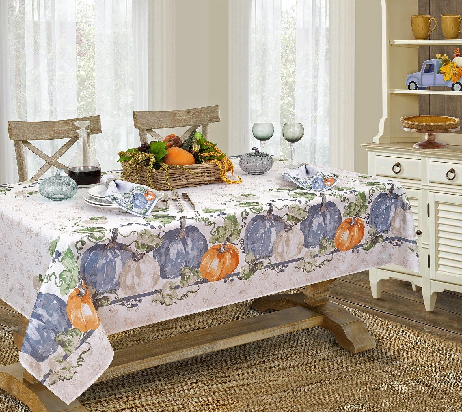 Newbridge Blue Pumpkin Vines stone-washed bordered tablecloth featuring pumpkin and vine patterns for fall and Thanksgiving decor.