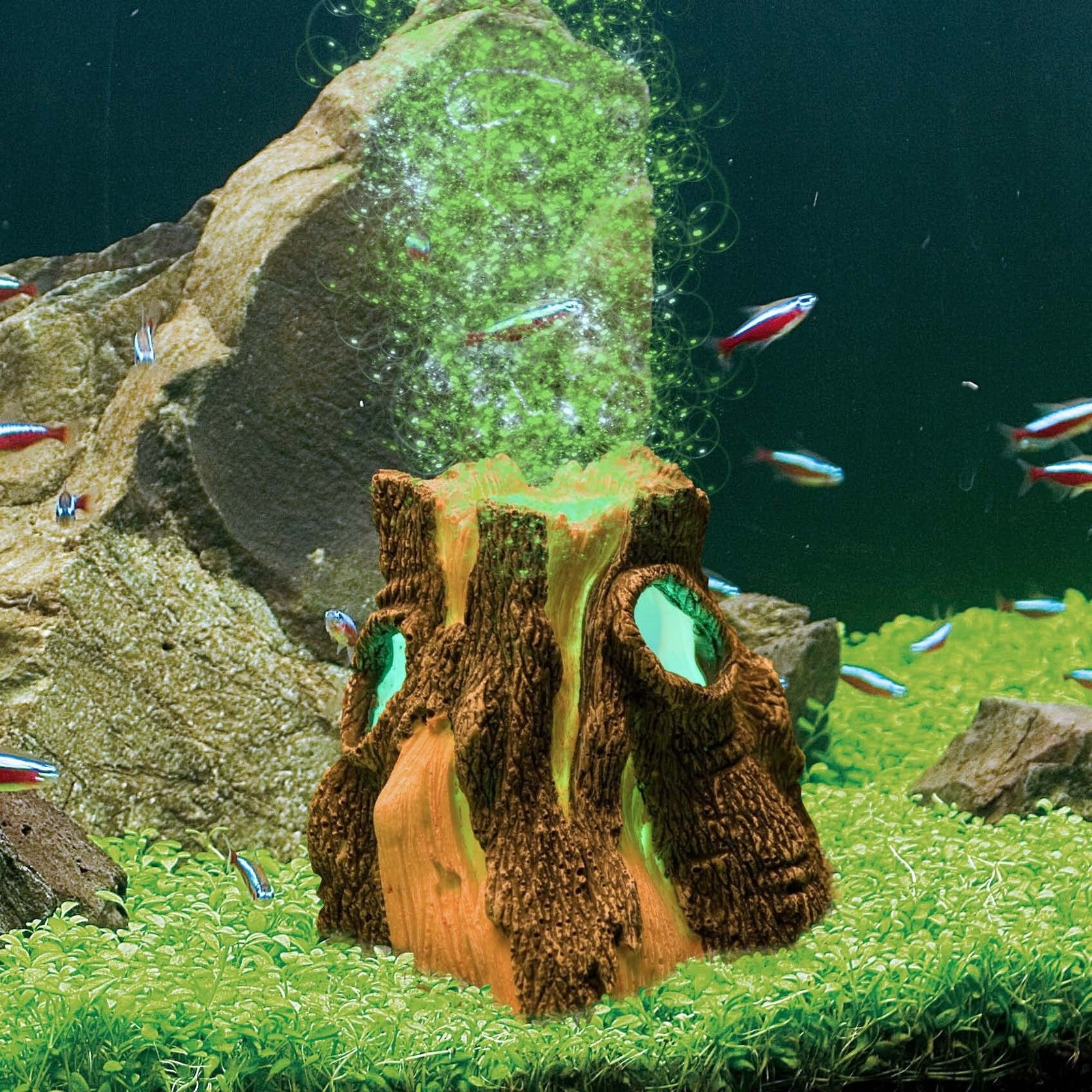 Ferplast Hydor H2Show Green Stump aquarium ornament with LED bubbles, suitable for 13-52 gallon fish tanks, featuring realistic log design.