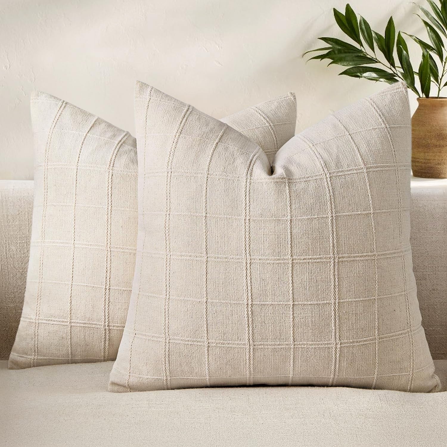 Pair of beige Woaboy linen check throw pillow covers, 26x26 inches, set of 2, farmhouse style, soft and textured fabric.