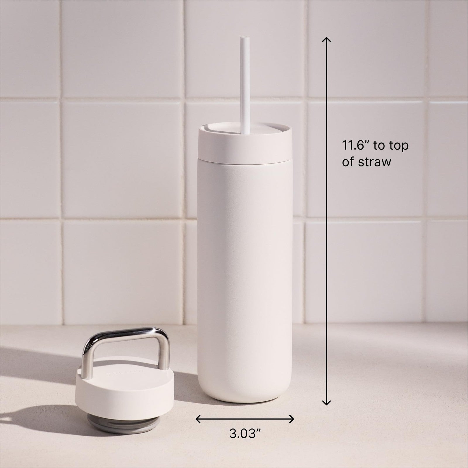 Fellow 20 oz Carter water bottle with leak-proof lid and metal handle, made for durable hydration on the go.