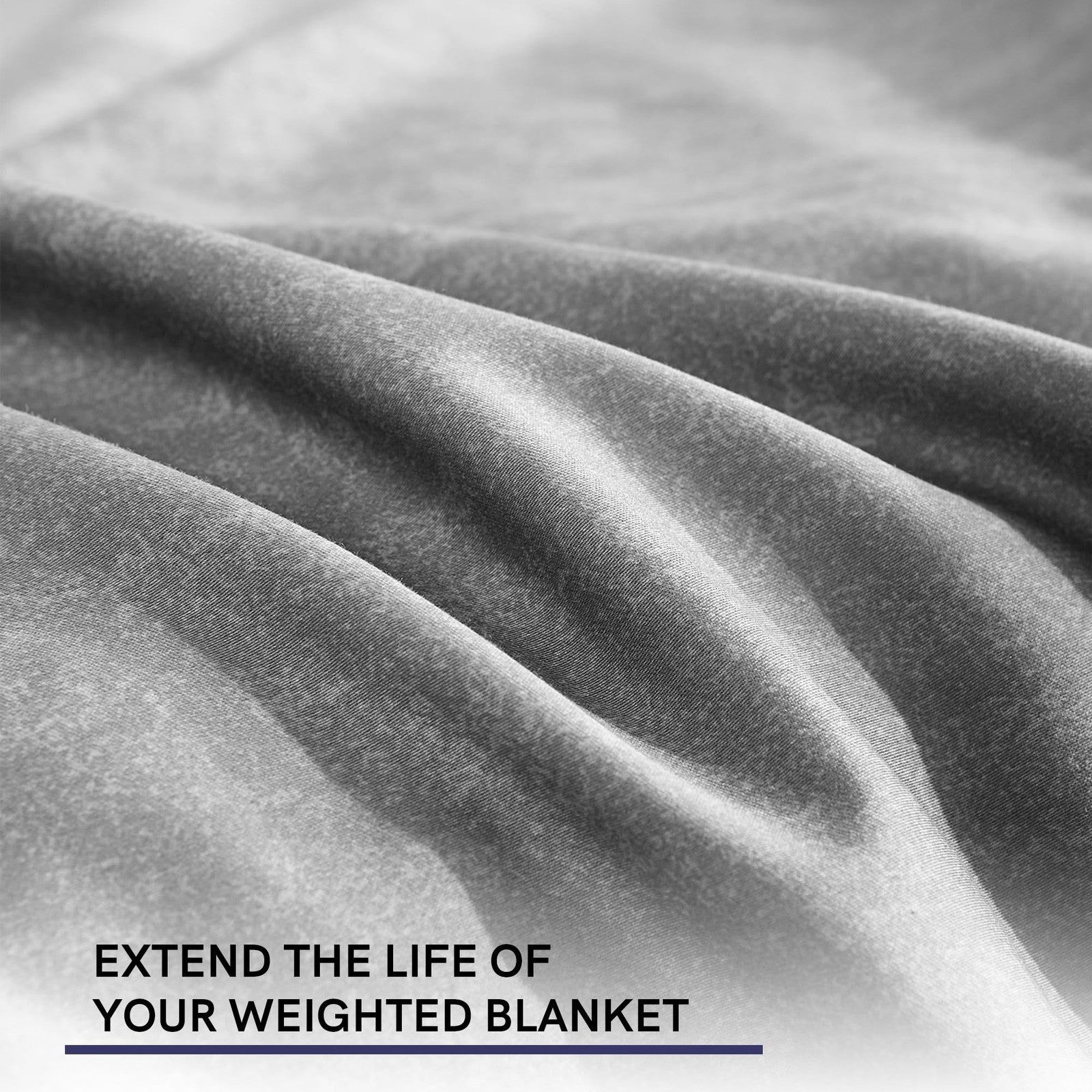 YnM cooling duvet cover in dark grey with gradient design, 60x80 inches, draped over a weighted blanket for a cozy look.