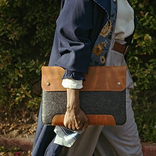 MegaGear genuine leather and fleece MacBook Pro sleeve with secure zipper closure and padded interior for protection.