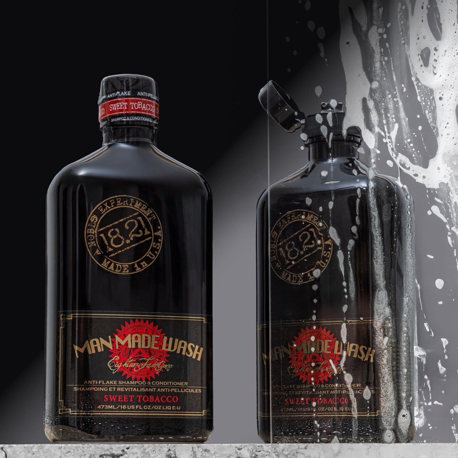 18.21 Man Made Anti-Flake 2-in-1 shampoo and conditioner bottle in Sweet Tobacco scent with sleek black packaging.