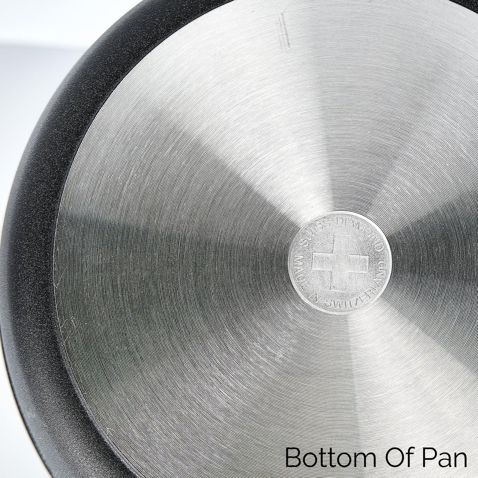 Swiss Diamond nonstick frying pan with lid, featuring diamond-coated nonstick surface and ergonomic handle for easy cooking.