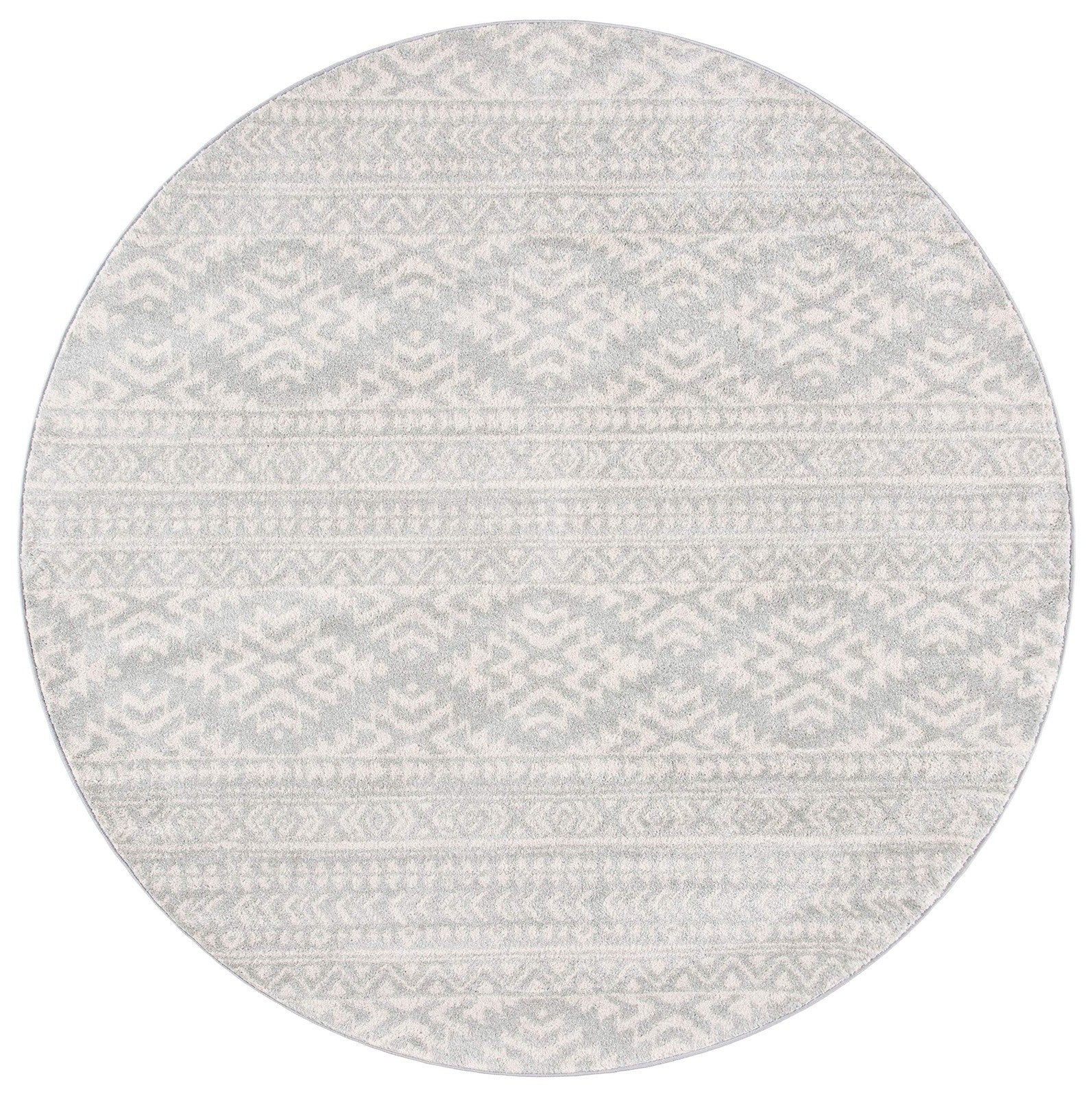 Round Safavieh Tulum Collection area rug featuring light grey and ivory Moroccan boho design with intricate patterns.
