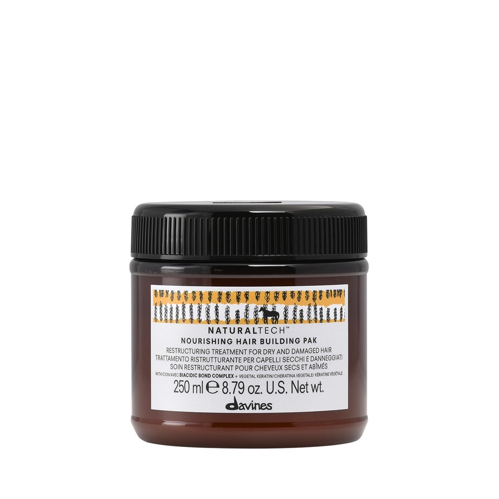Davines Naturaltech Nourishing Hair Building Pack applied to hair shaft, showcasing a nourishing treatment for damaged hair.