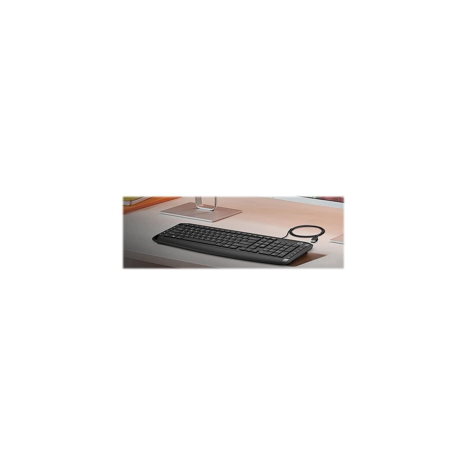 HP Pavilion wired keyboard and mouse set in black, featuring full-size keys, USB-A connection, and sleek design.