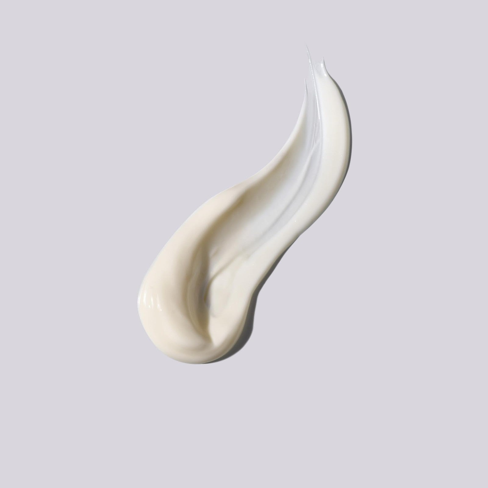 shu uemura art of hair Essence Absolue Nourishing Cream for heat protection, showing the cream in a sleek jar with a gold lid