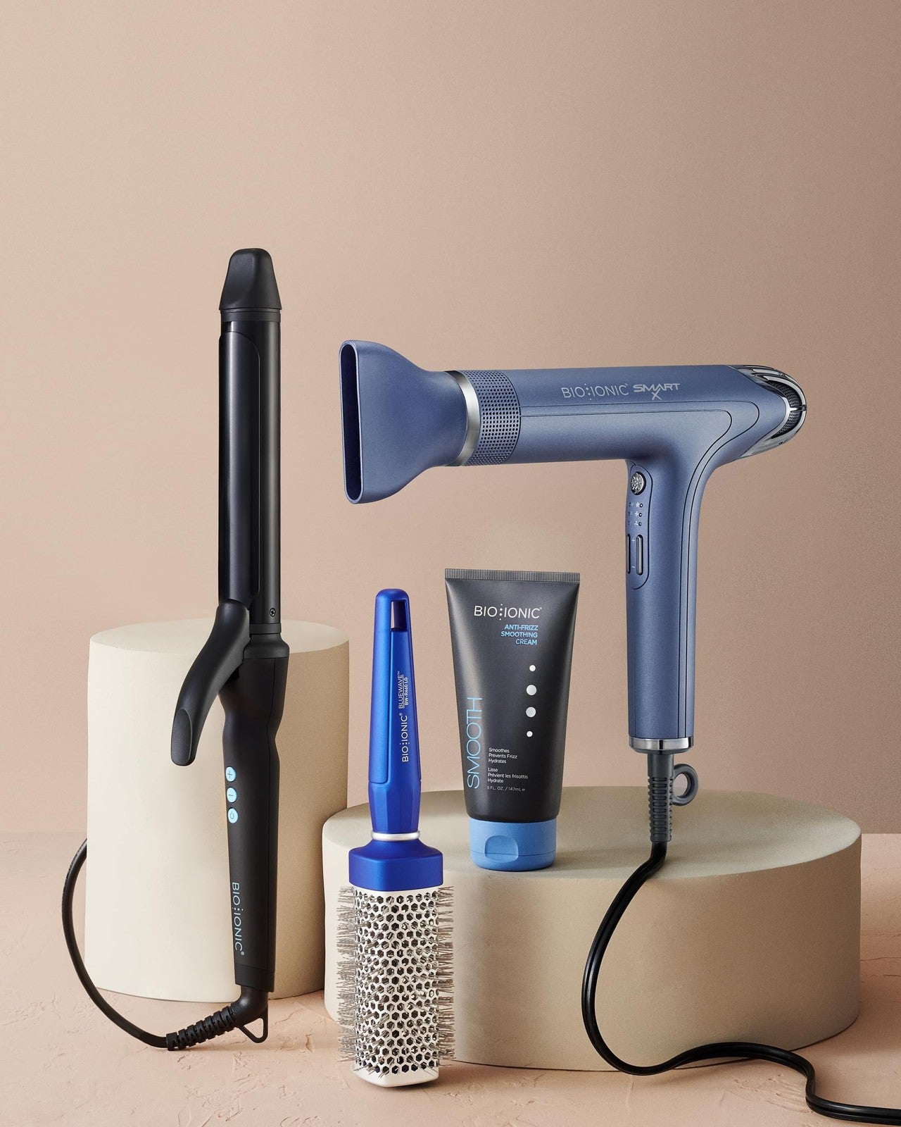 BIO IONIC BlueWave NanoIonic Conditioning Brush in medium size, showing the sleek blue brush with bristles for frizz control and shine.