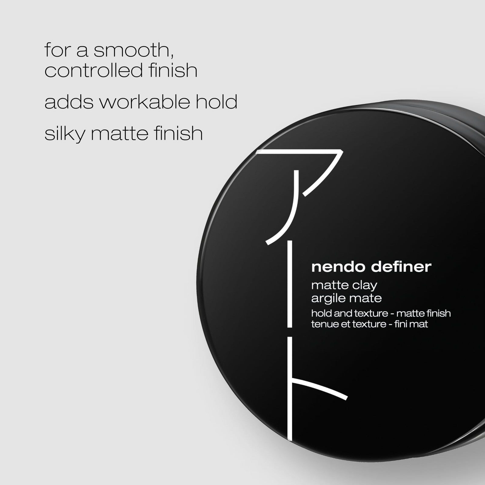 shu uemura art of hair Nendo Definer Pomade showing textured strands and workable hold in a styled hair look.