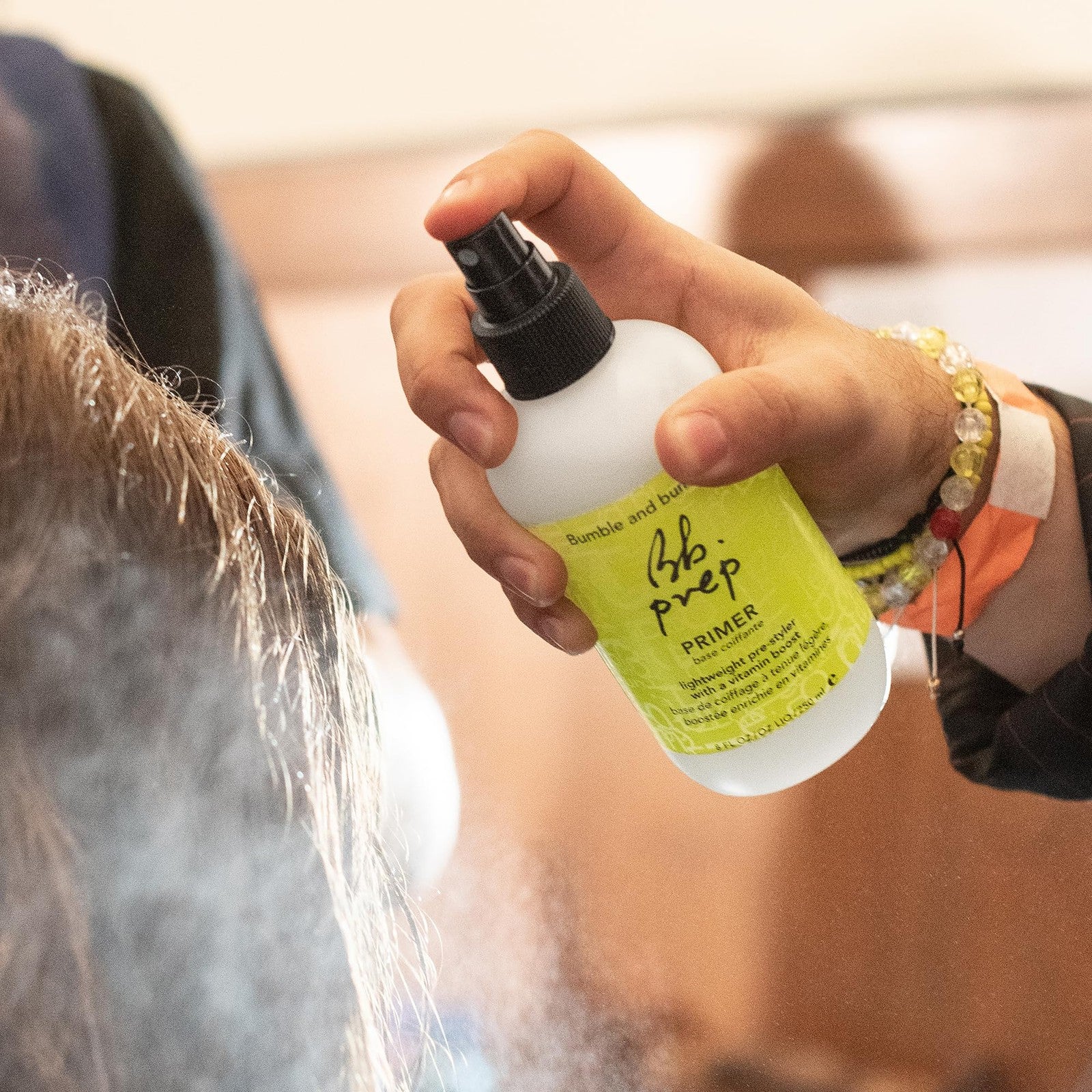 Bumble and bumble Prep Detangling Hair Primer for curly hair, lightweight pre-styler, with a squeeze bottle and pump dispenser.