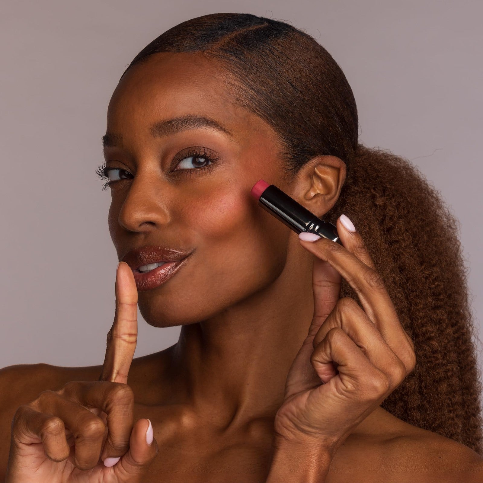 Perricone MD No Makeup Blush Balm in cream form with natural-looking pink shade, smooth application on cheeks.