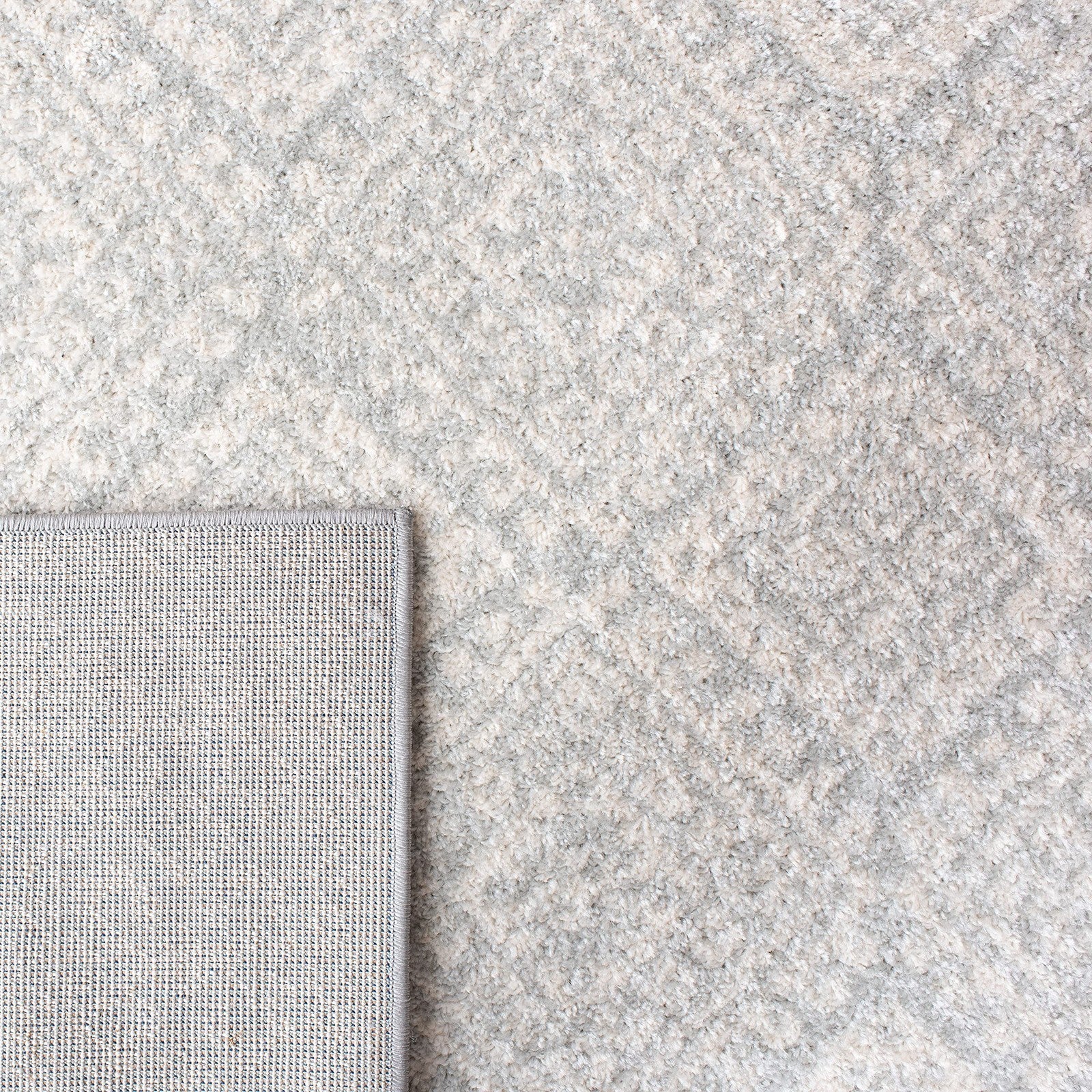 Light grey and ivory Moroccan boho Safavieh Tulum Collection runner rug with geometric patterns, 2x9 feet long.