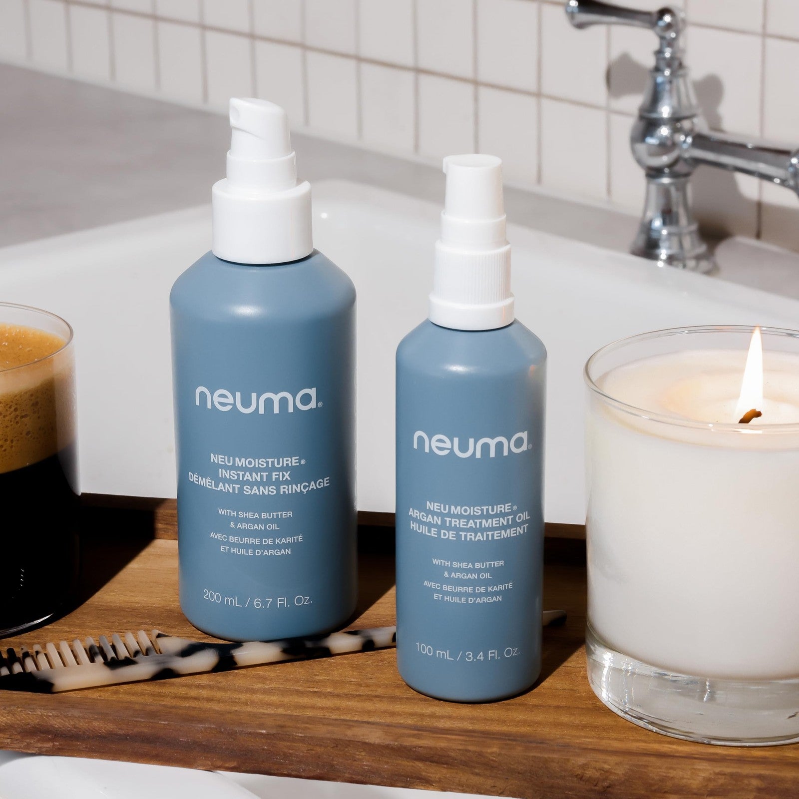 NEUMA Neu Moisture Instant Fix leave-in hair treatment spray bottle, detangling and hydrating hair care product.