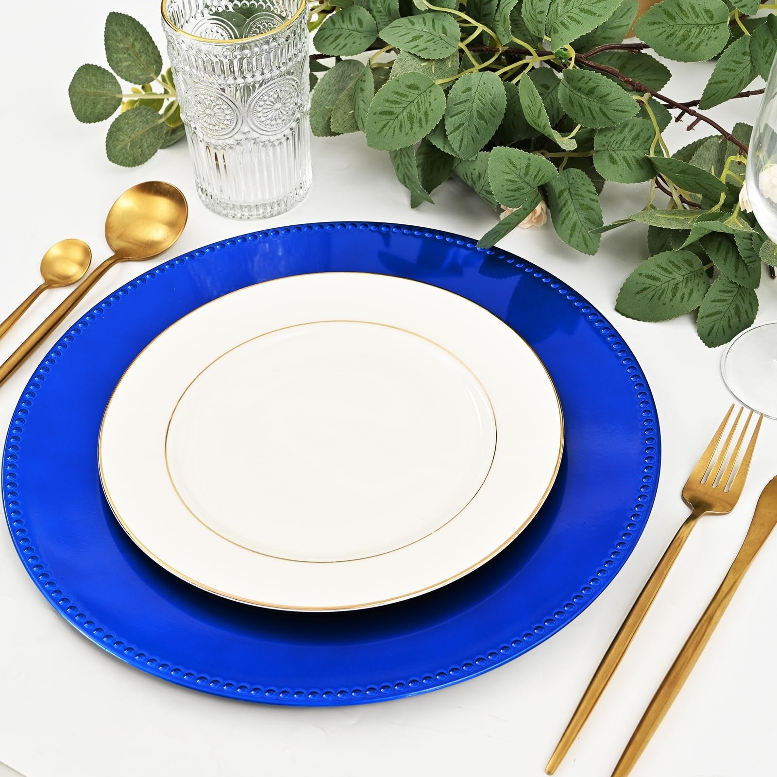 Royal blue 13-inch round beaded charger plates from REWOMC, set of 24, ideal for elegant dinner table settings.