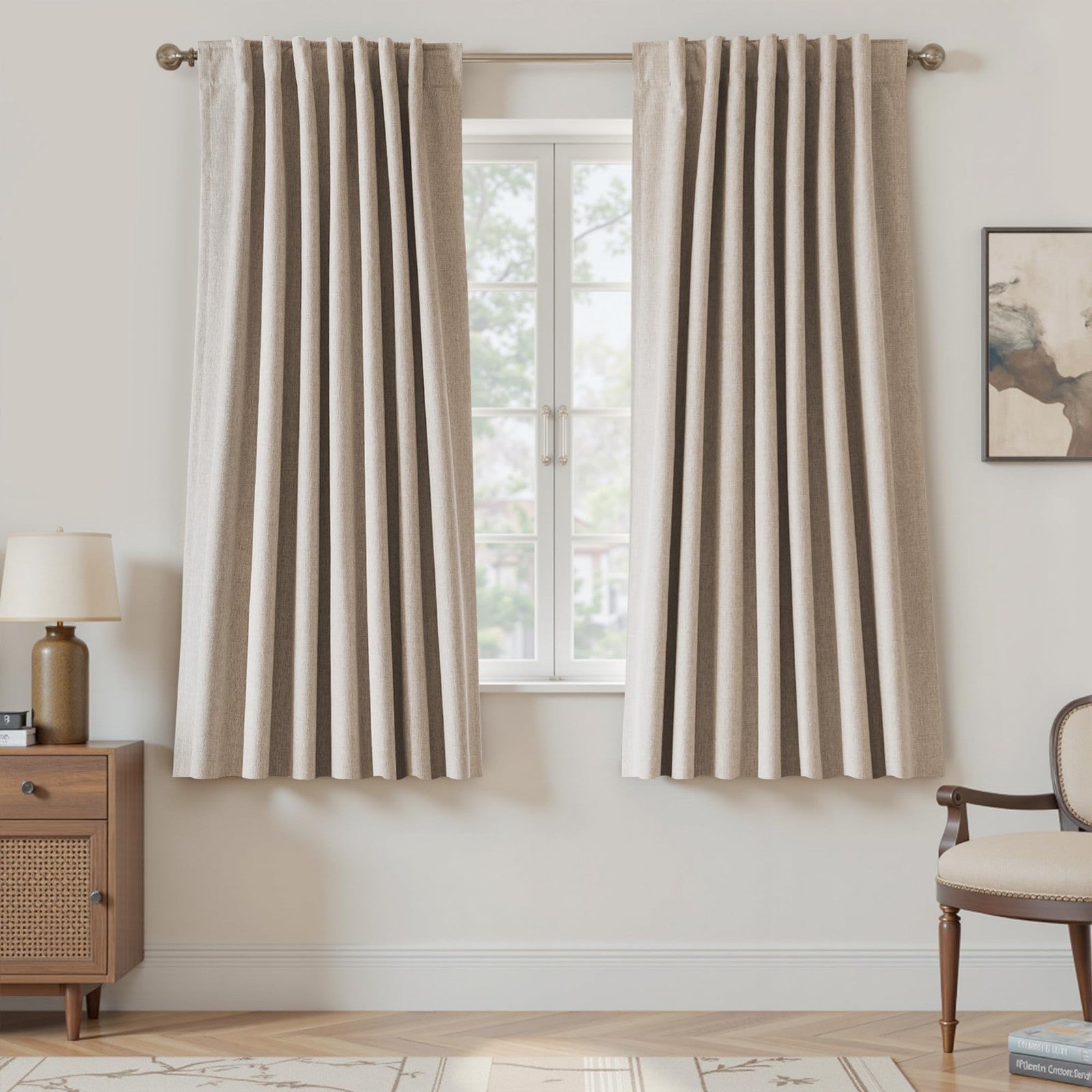 UHITECH 63-inch black blackout curtains, two-panel set, blocking sunlight for living room or bedroom windows.