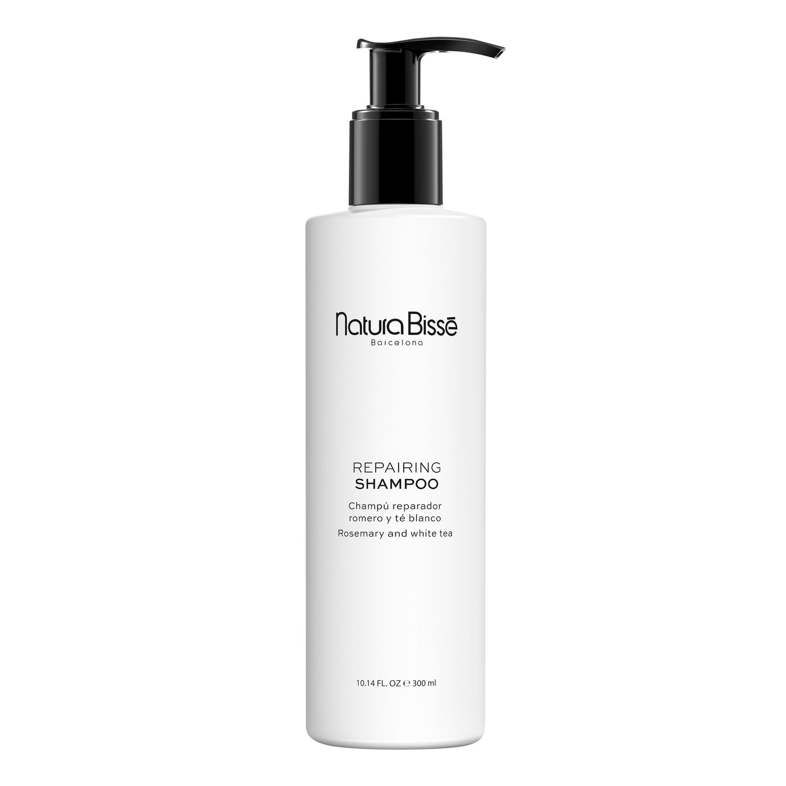 Natura Bissé Repairing Shampoo bottle with rosemary and white ingredients, showcasing hydrating and repairing hair care features.