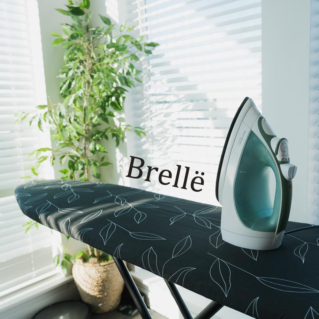 Full size Angora Brands ironing board with padded surface and metal legs, suitable for home laundry and garment ironing.
