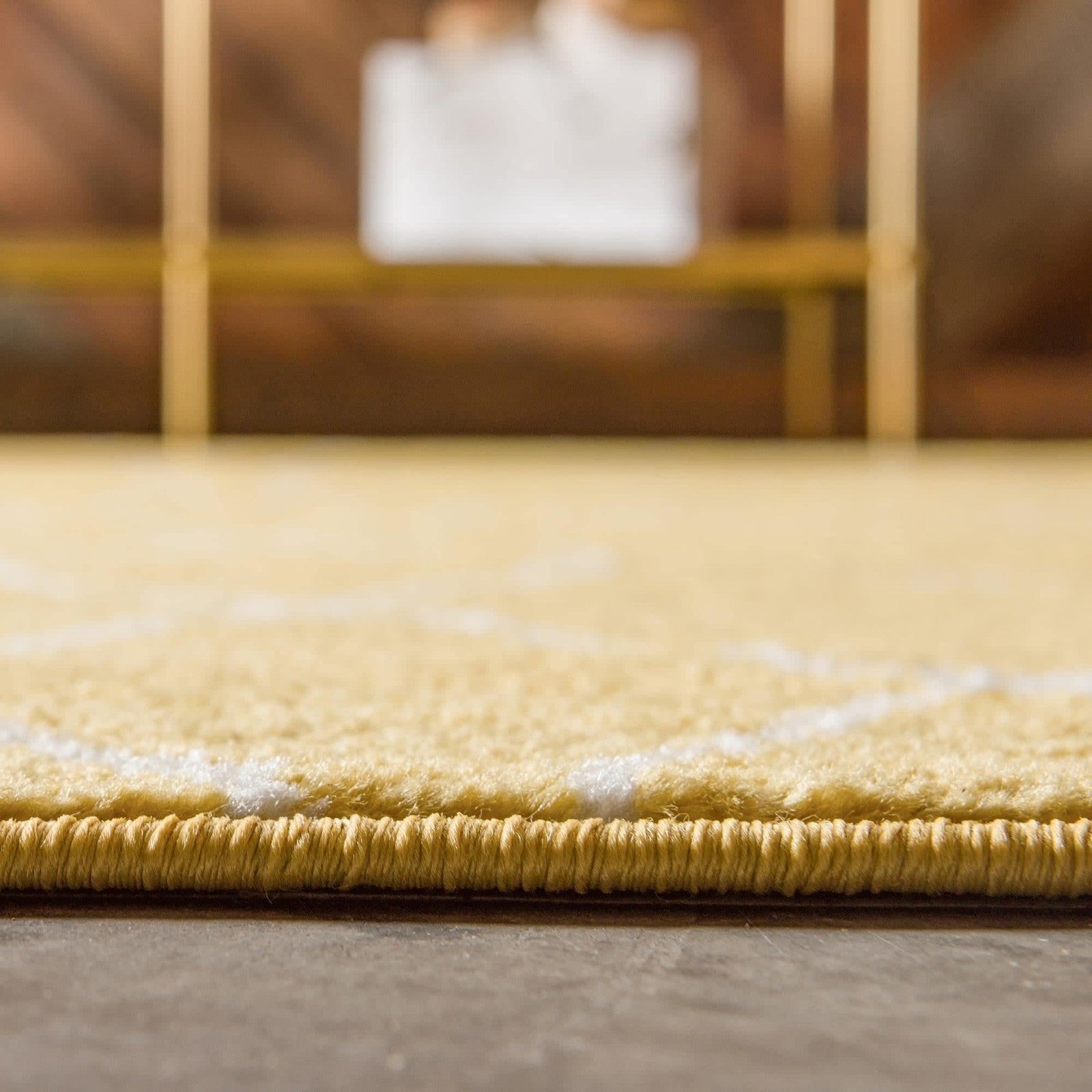 Unique Loom Trellis Frieze Collection geometric area rug with yellow and gray round pattern, showcasing its textured design.